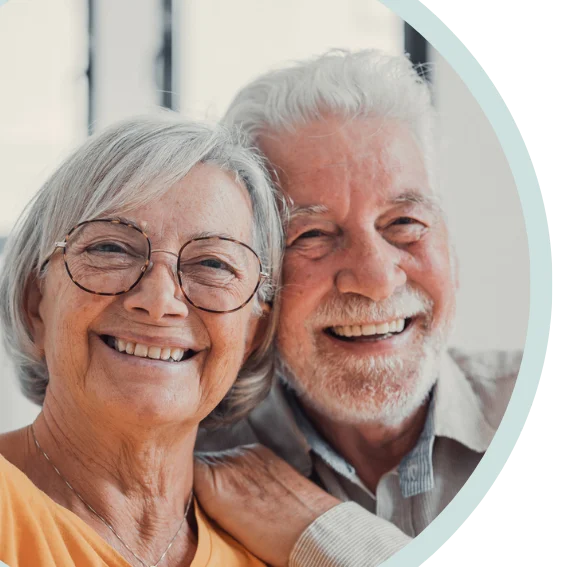Senior couple smiling, woman wearing eye glasses