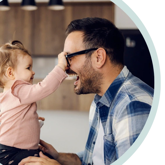 Dad smiling at daughter