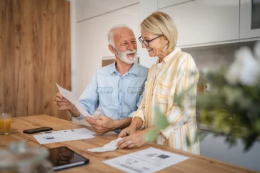 A senior couple in their kitchen